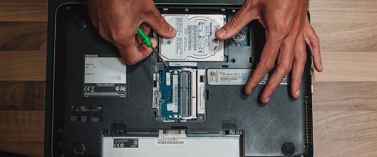 Laptop being repaired in Whitchurch