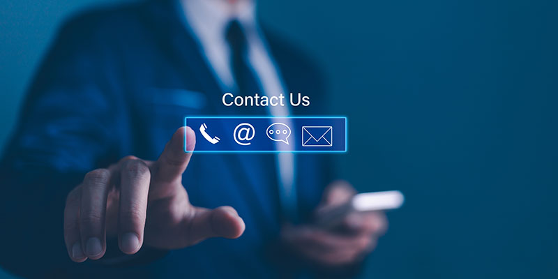 Businessman contacting IT manager