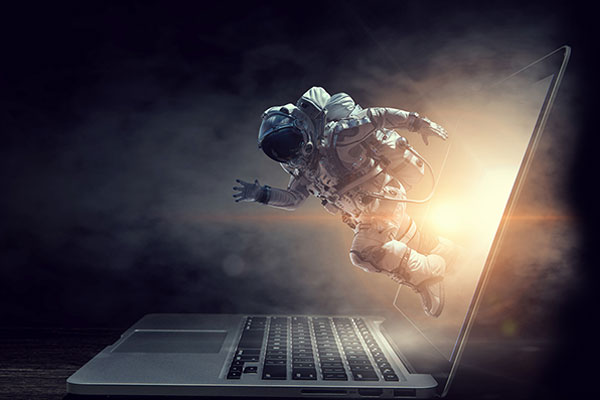 Spaceman jumping out of laptop screen