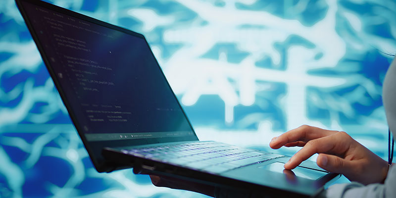 Business woman using laptop
